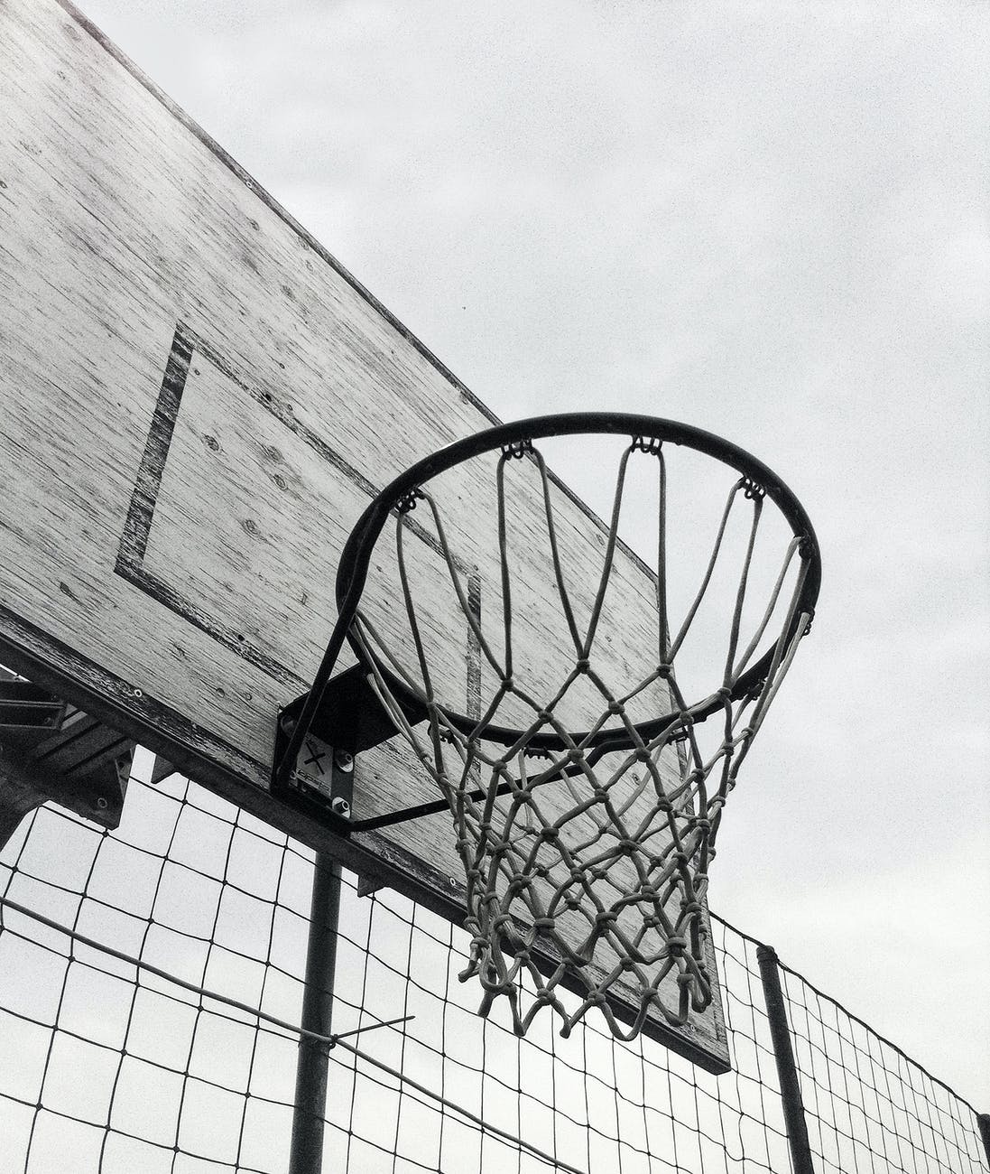 grayscale photography of basketball hoop