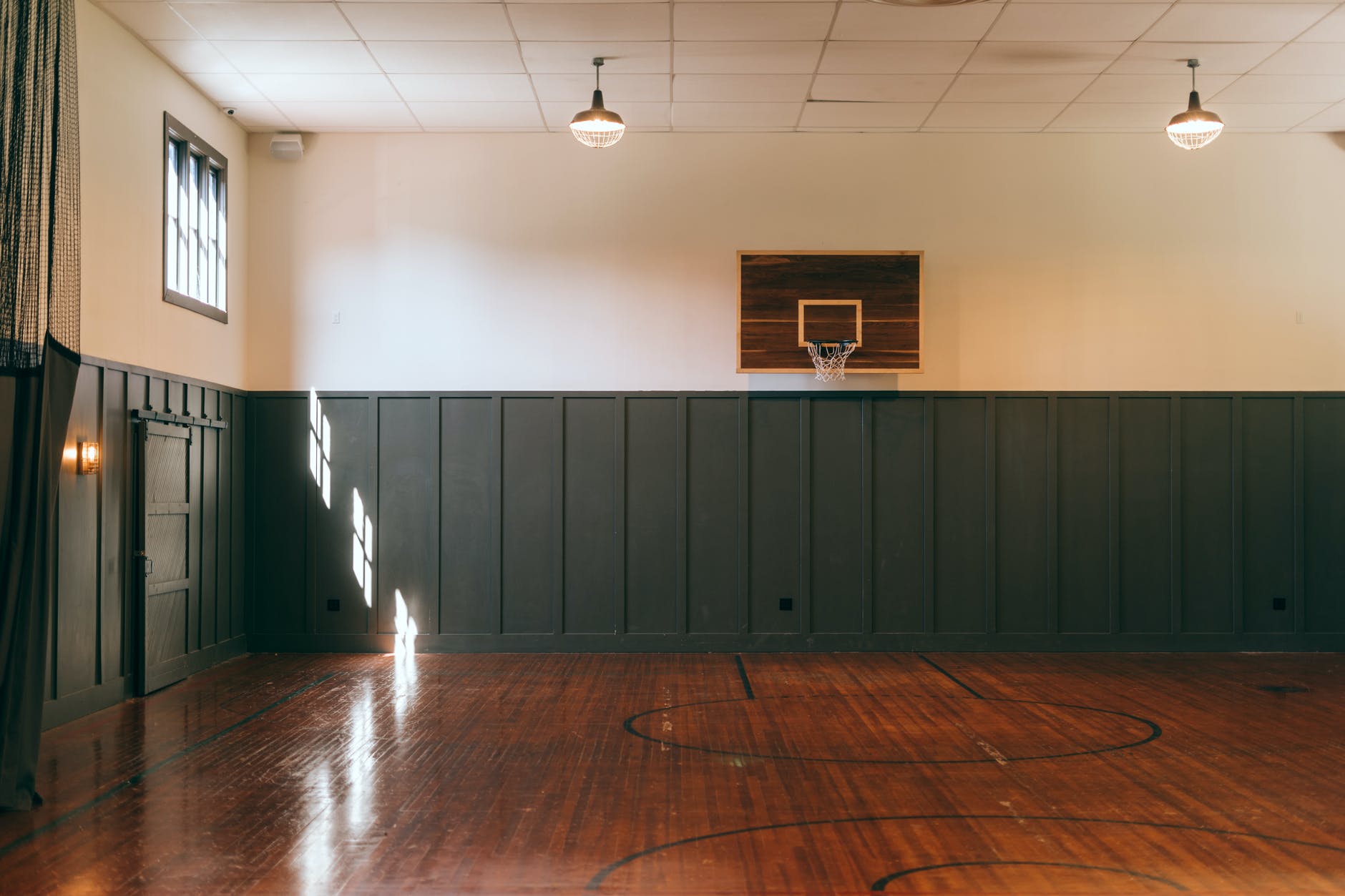 interior of indoors basketball court in sports center
