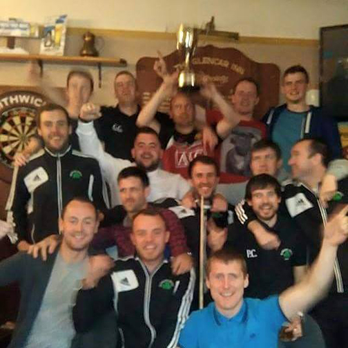 Glencar Celtic celebrate winning the Donegal Junior League Downtown Cup in the Glencar Inn in 2014-15 [Reference: 4][Picture Credit: Glencar Celtic Facebook]